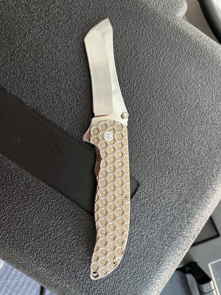 High-end folding knives sharpened with care.